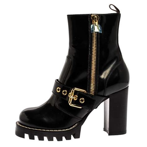 louis vuitton buckle boots.